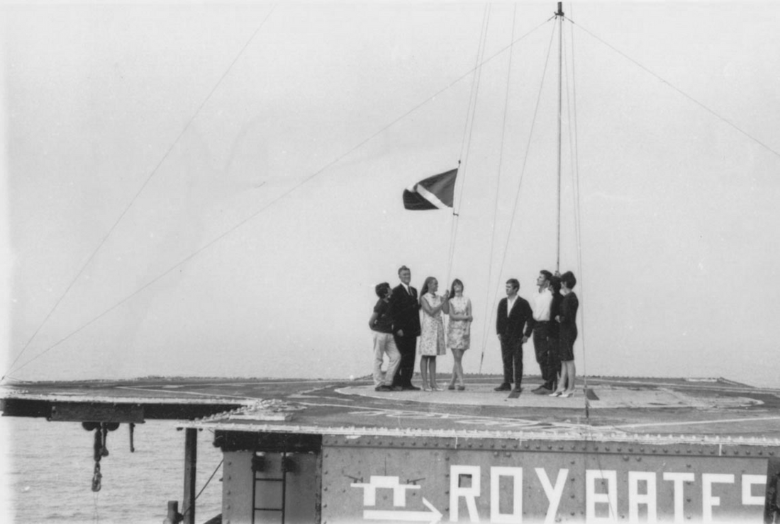 Roy and Joan Bates and the first Sealand flag, 1967